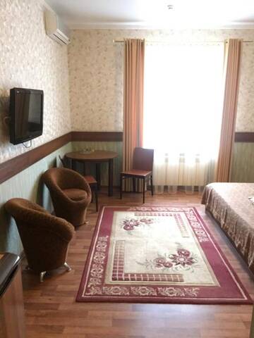 Номер с кроватью размера «king-size» в Гостинице Grand Hotel